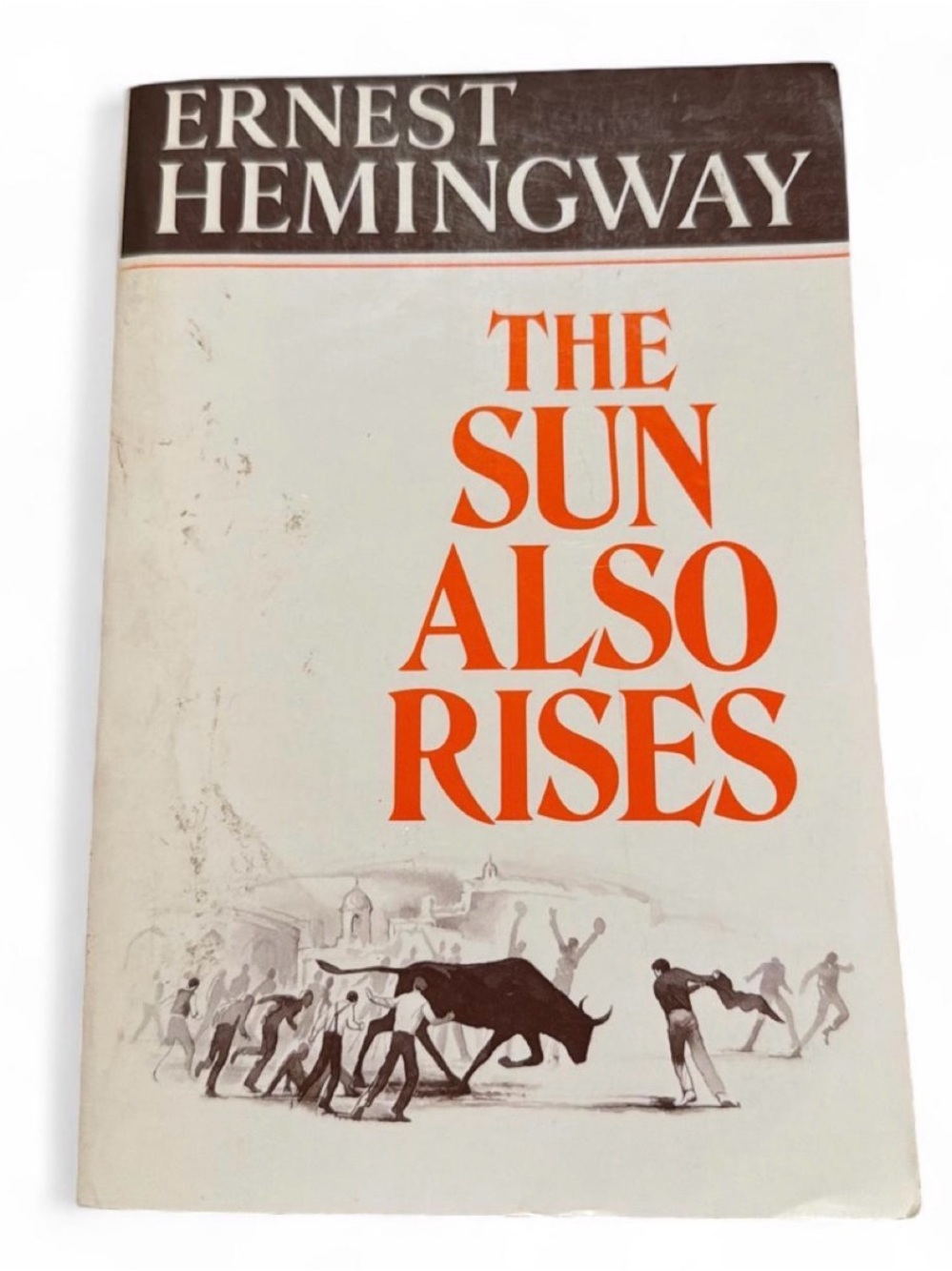 Ernest Hemingway "The Sun Also Rises" — White Cover with Orange Title